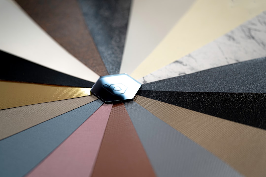 Exhibition Stand Finishes Compared: Laminate, Veneer, Fabric SEG, and Vinyl for European Builds